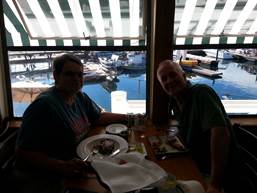Roche Harbor -- Both of us smiling at the dinner table, despite the price tag