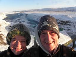 Gulfoss -- Lydia & Paul selfie with falls behind (it was 18 and blowing about 30 mph, so those aren't tears of joy)