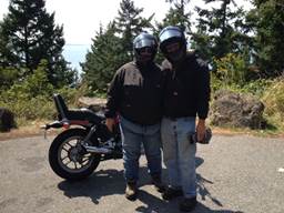 Chuckanut Drive viewpoint -- Lydia & Paul with helmets on (Tom's cam)